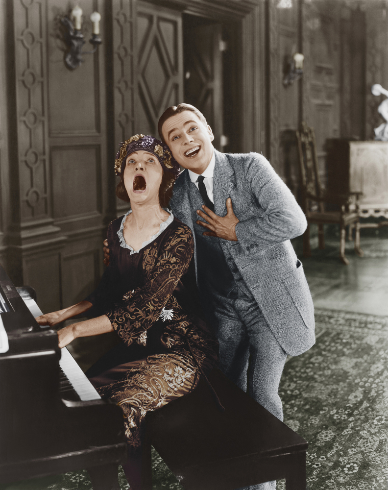 Vintage photo of couple hitting high notes