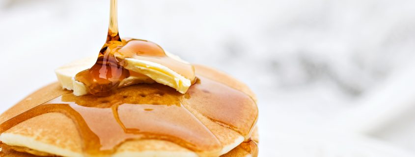 Pancake stack with butter and syrup